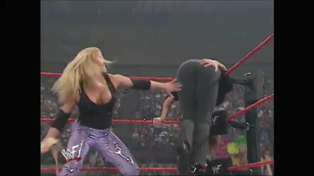 Stephanie McMahon-Helmsley vs Trish Stratus (Whipping Match)