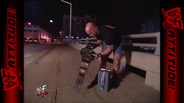 Stone Cold throws Kurt Angle's medals from the bridge