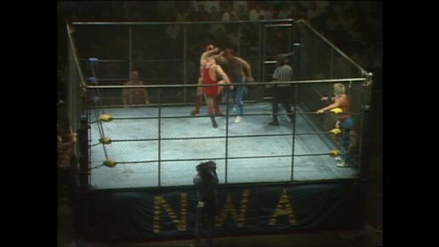 NWA: The Rock 'n' Roll Express vs Ivan Koloff and Nikita Koloff (Steel cage match)