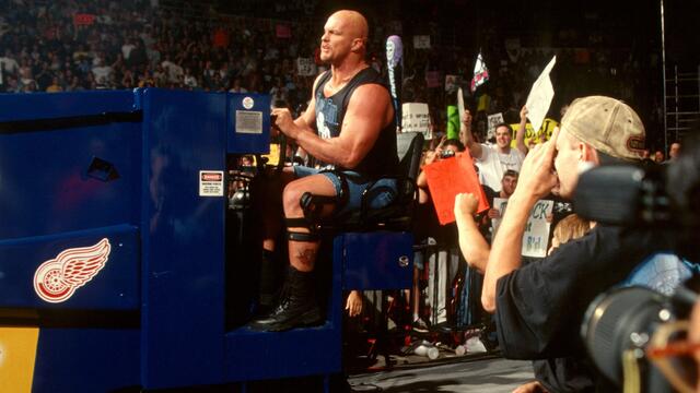 Stone Cold drives a zamboni to the ring