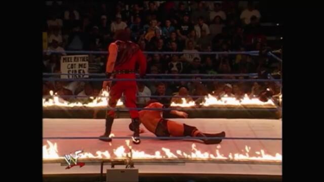 Triple H vs Kane in an Inferno match