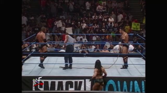 Triple H vs The Rock in a Brahma Bullrope match