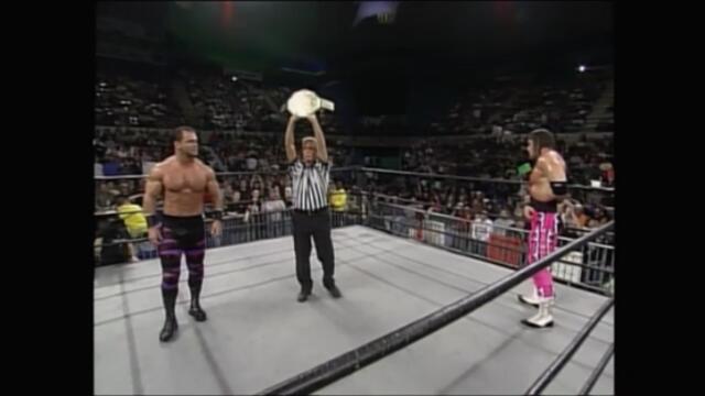 Chris Benoit vs Bret Hart in a match for the WCW World Heavyweight Championship