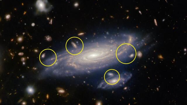 NASA James Webb Space Telescope Capture Small Merging Galaxies into Giant Spiral Galaxy LEDA 2046648