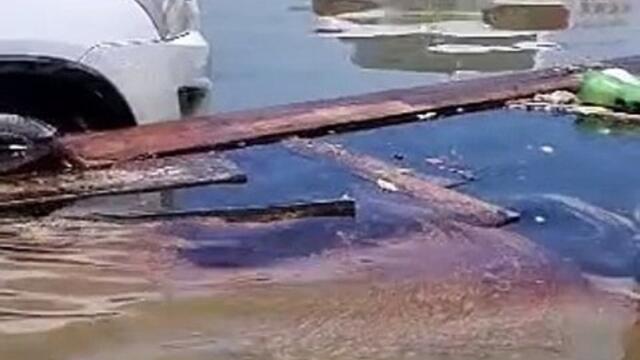 Sharjah Residents in flooded areas notice oil slick for over 2 kilometers in accumulated water