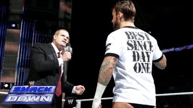 After calling out his enemies, CM Punk gets chokeslammed by Director of Operations Kane