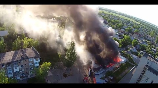 Moment of shell explosion in Donetsk caught on camera/aftermath drone footage