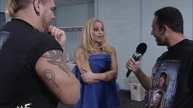 Chavo Guerrero and Hugh Morris backstage Trish Stratus