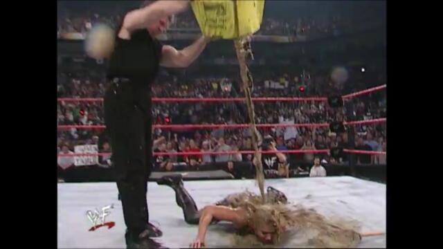 Stephanie McMahon-Helmsley & William Regal vs Trish Stratus & Vince McMahon