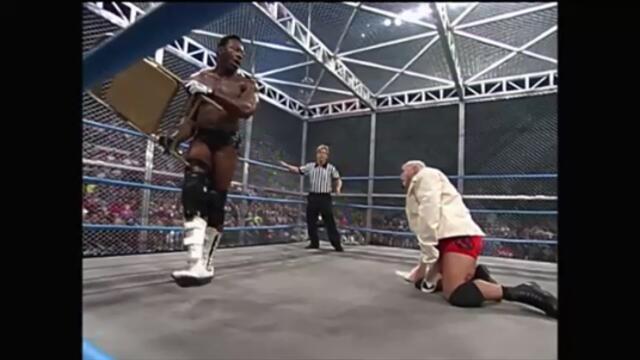 Scott Steiner vs Booker T (Straitjacket steel cage match)