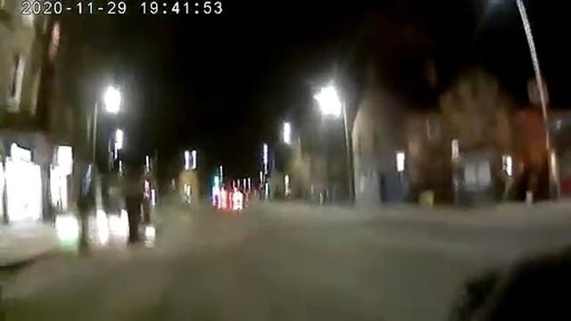 A bus overtakes a cyclist at a close distance in Edinburgh