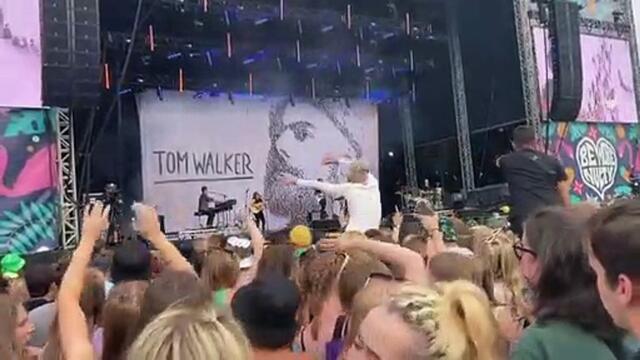 Woman proves crowdsurfing is not just for teenagers