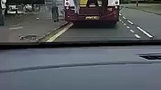 Youths spotted clinging on to back of Edinburgh bus.