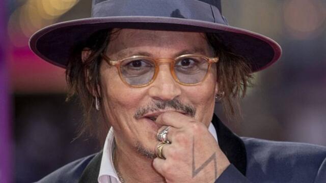Johnny Depp making the voice of Jack Sparrow for a child in Deauville France