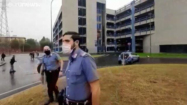 Italy: 'Eight killed' as light plane crashes into empty office building in Milan suburb