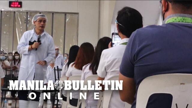 Presidential aspirant and Manila Mayor Isko Moreno speaks at a food production facility in Pampanga