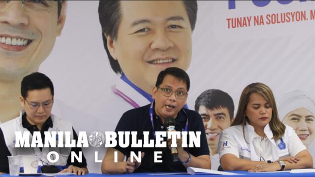 Aksyon Demokratiko speaks to members of the media during a press conference in their campaign HQ