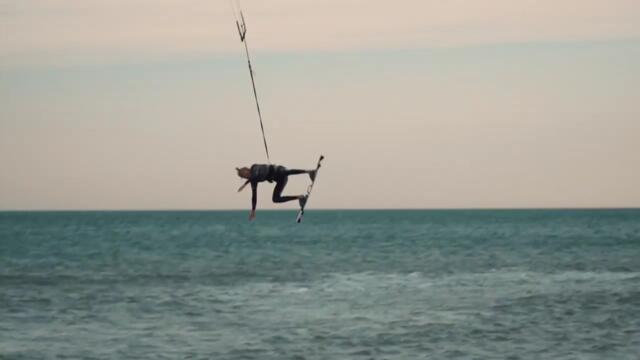 Kiteboarder Falls Face First Into Water Following Failed Trick