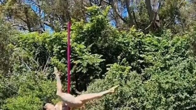 Australian Pole Champion Shows Amazing Moves While Hanging Upside Down on Pole