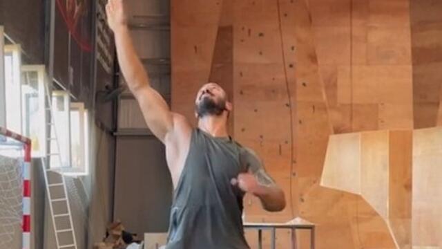 Fitness Professional Swings And Juggles Heavy Kettlebell With One Hand