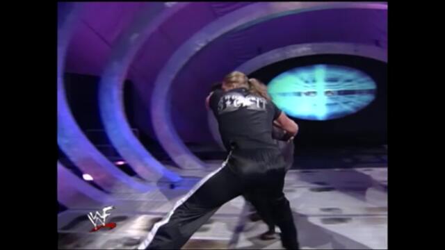 Triple H throws Shane off the ramp