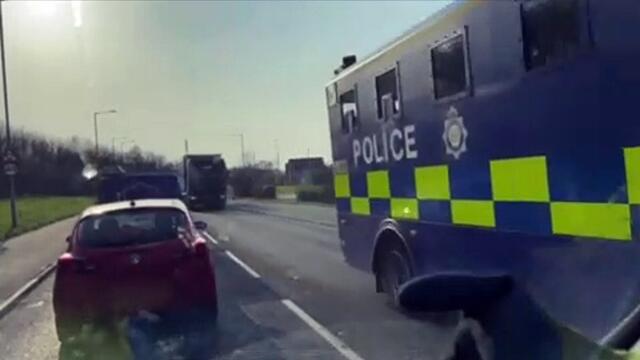 Moment military convoy travels through Preston
