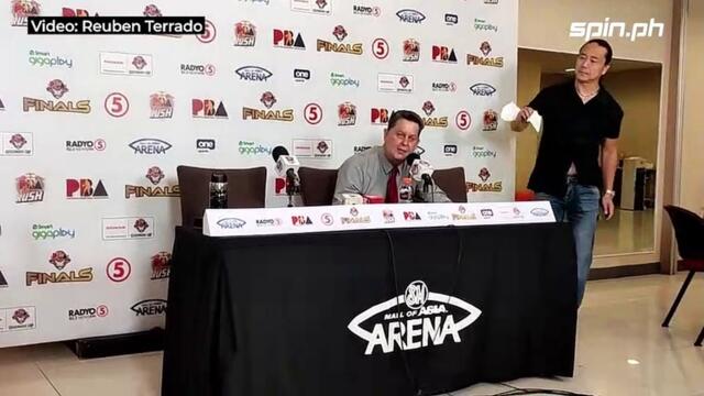 Alfrancis Chua approaches Tim Cone in a presser