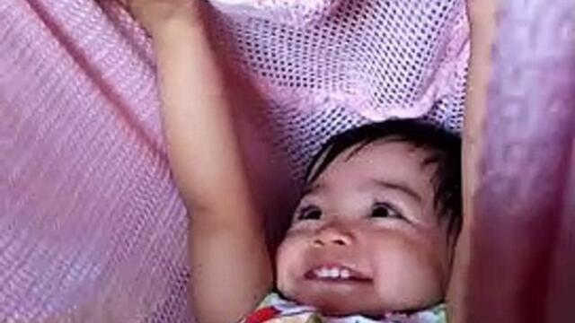 TWINS TOGETHER AT PLAY