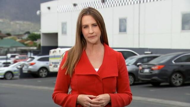 Search for man who fired shots at police enters second day