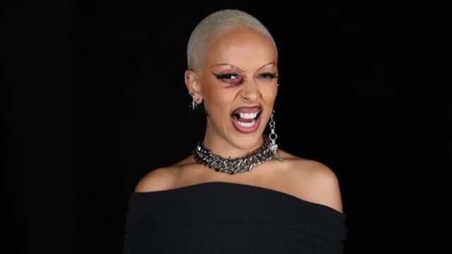 Doja Cat Explains Her Black Eye & Busted Lip Look at Paris Fashion Week | Billboard News