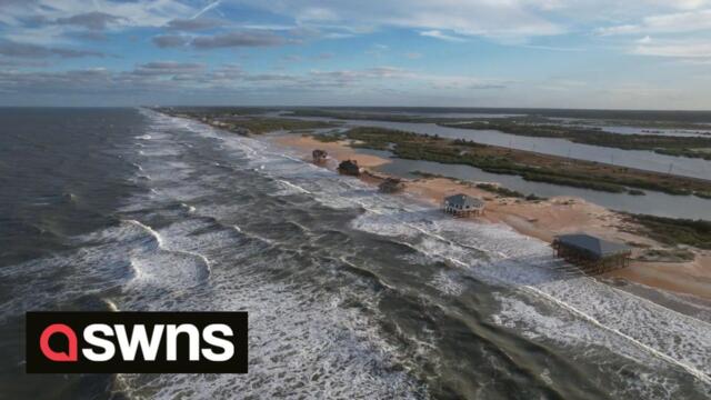 Houses surrounded by water as historic inlet reopens as a result of Hurricane Ian
