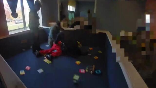 Moment suspect runs into Ohio daycare playpen while children play