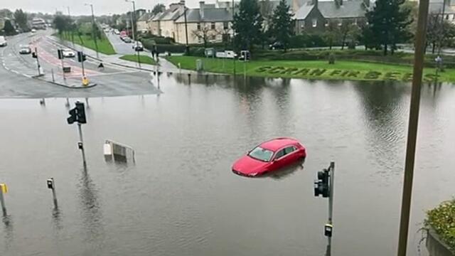 Cars trapped due to heavy flooding at busy junction in Edinburgh