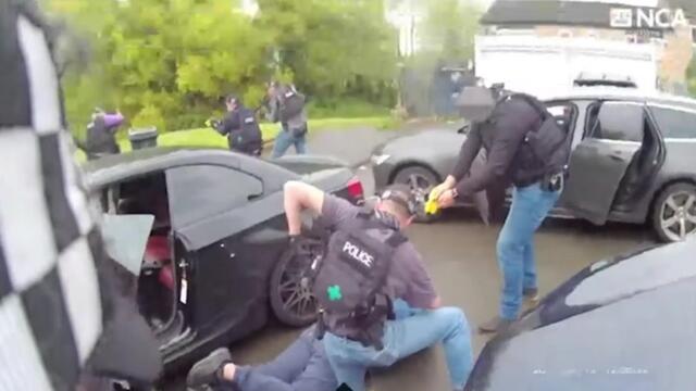 Moment weapons gang arrested at gunpoint in Birmingham suburb