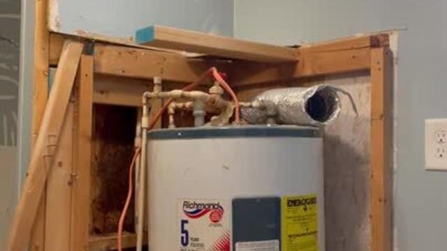 Woman Fails Hilariously While Attempting to Remodel Water Heater