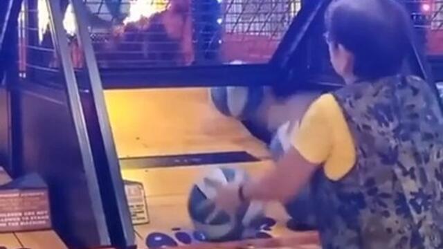 Grandma Makes New Basketball Record at Gaming Arcade