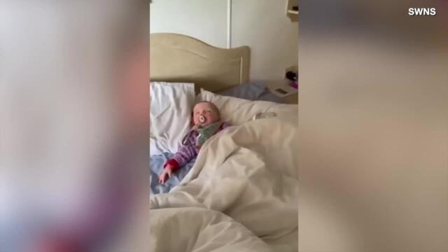 Mom Tries to Sneak Away from Napping Baby