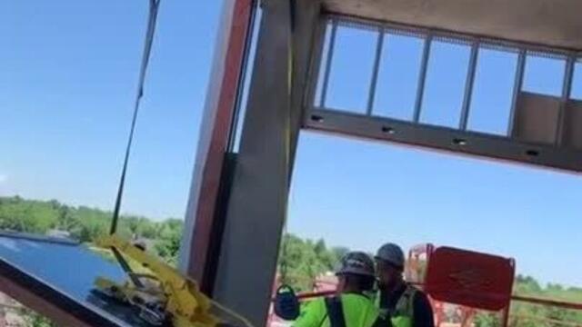 Workers Drop Heavy Glass Window Off High Rise Building