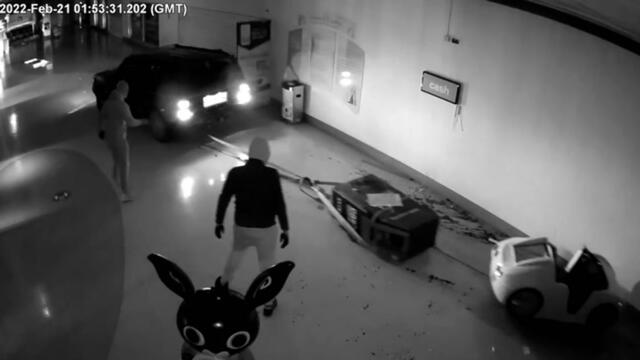 Moment ram raiders are caught by police after dragging ATM from shopping centre using 4x4