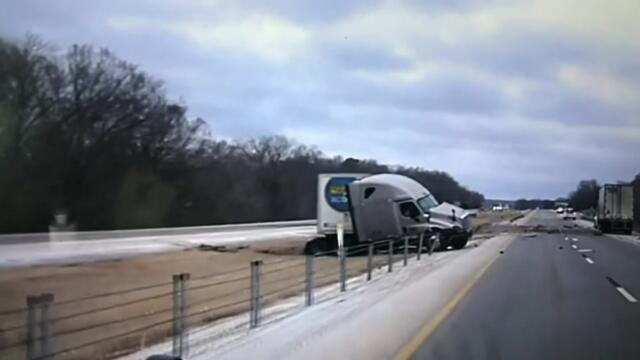 Moment lorry skids across highway into oncoming traffic after losing control in icy conditions