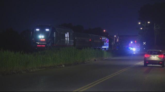 Police: 2 people killed in car hit by train had fled drag racing scene