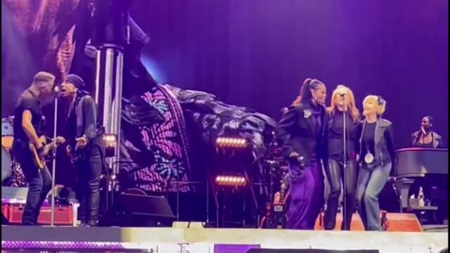 Moment Michelle Obama joins Bruce Springsteen to sing and play tambourine on stage