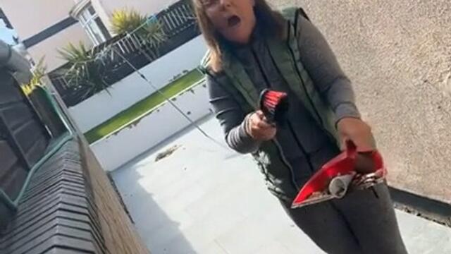 Guy Screams to Scare His Neighbor While She Cleans Her House From Outside