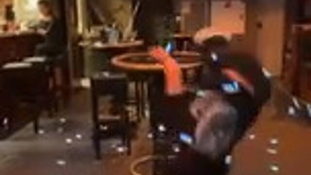 Guy Crashes Into Table While Attempting to Perform Backflip at Bar