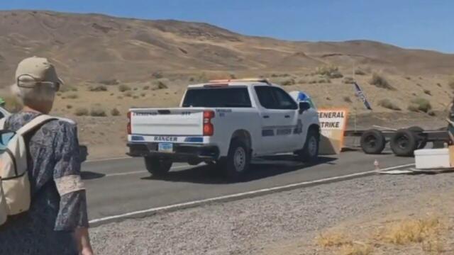 How Nevada Police 'dealt with' climate protesters blocking road to Burning Man Festival
