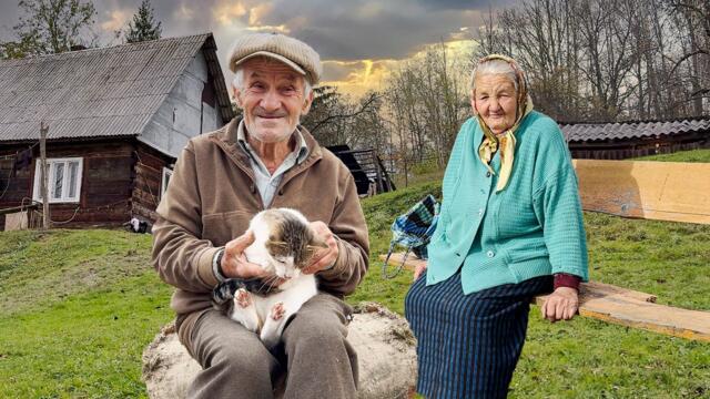 Happy old age of an elderly couple in a mountain village far from civilization