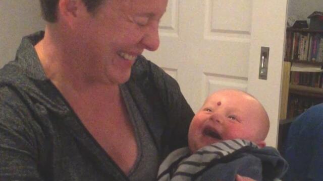 Baby Laughs at Mom Putting Pacifier in Mouth