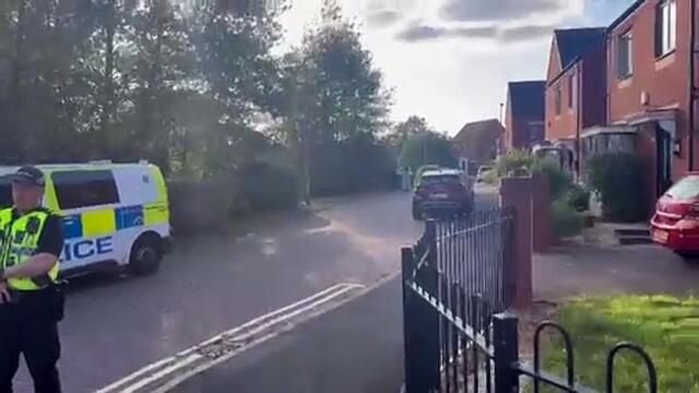 Police on duty near canal at Persimmon Estate in Ettingshall, Wolverhampton, after a person falls into the canal
