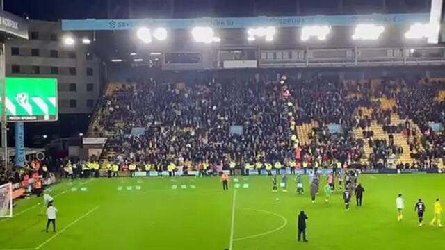Leeds fans and players applaud each other at Carrow Road