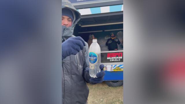 Packers fan opens water bottle to watch it freeze instantly in icy Green Bay weather